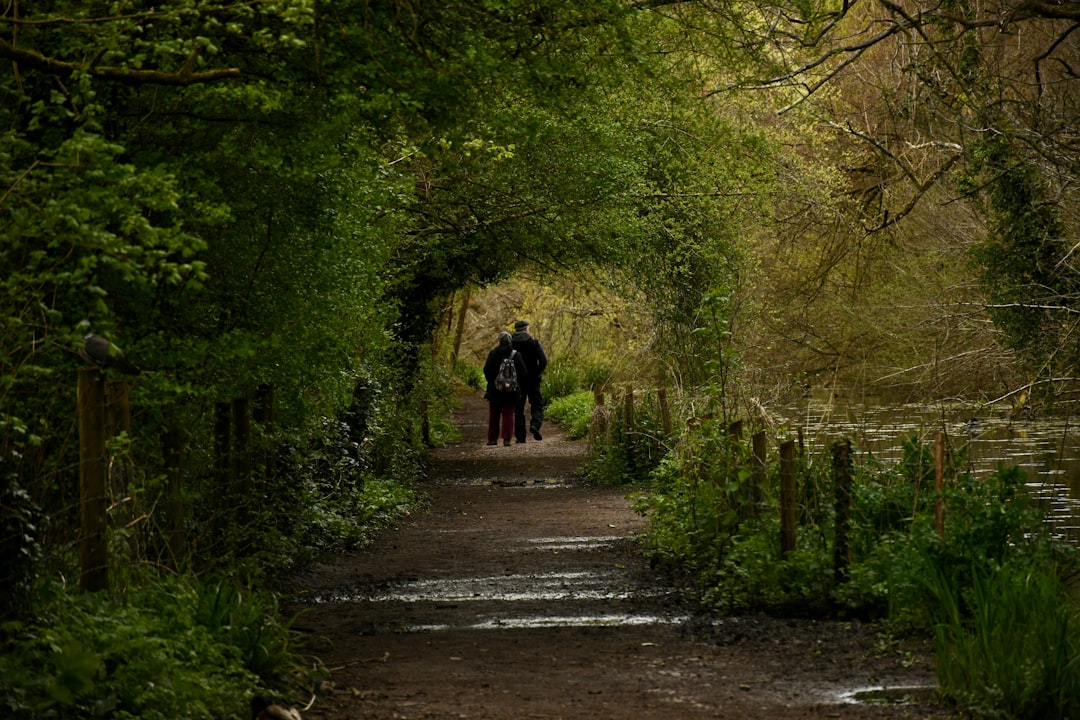 couple walking trail together countryside - Camino de Santiago